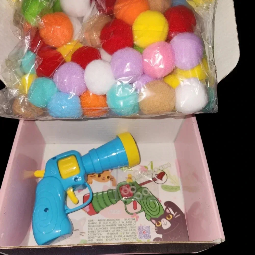 Perfect Cat Toy! This Comes With So Many Pom Pom Balls & Toy Gun That Shoots Em!